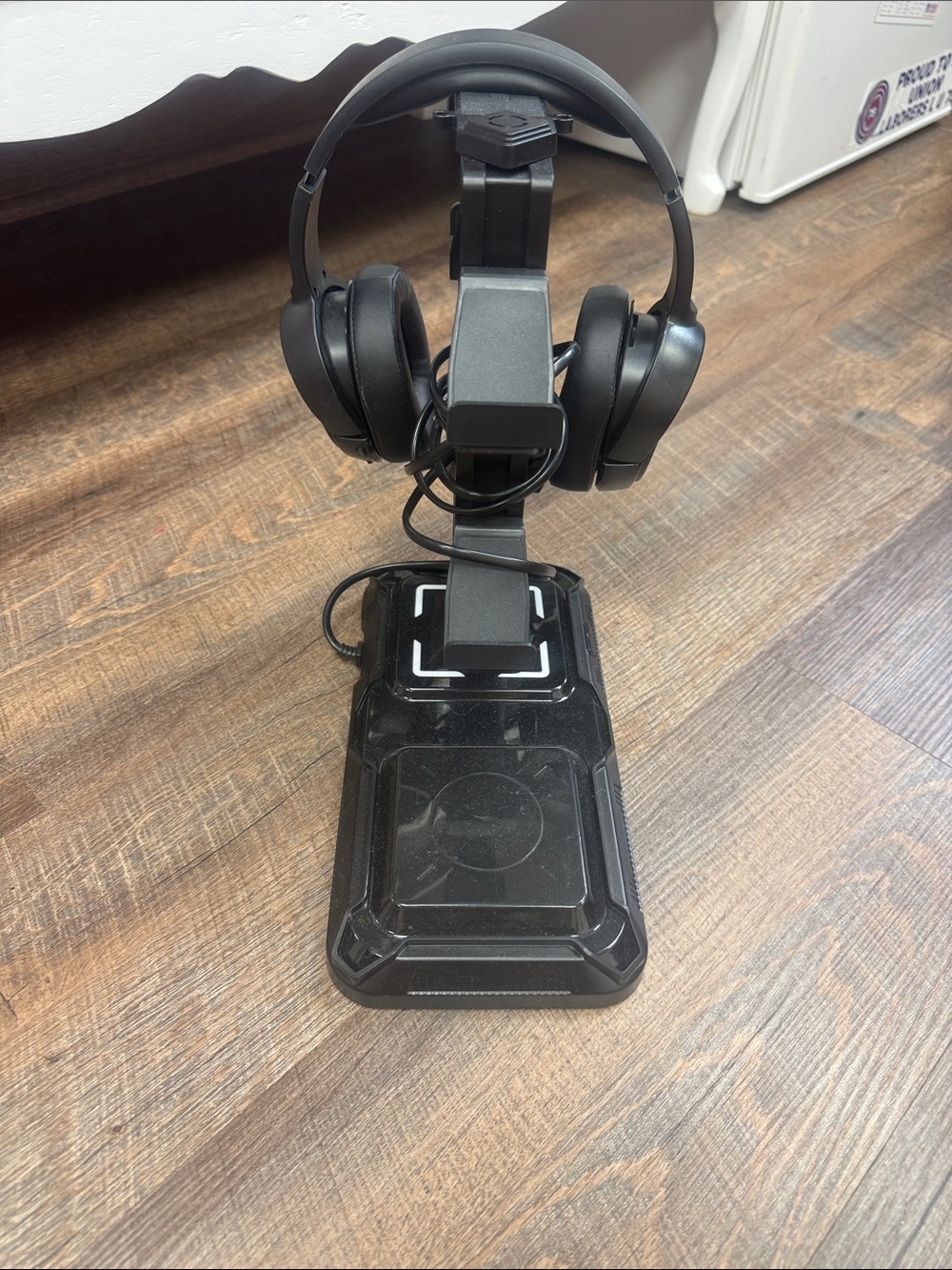 Black Over-Ear Headphones on Stand